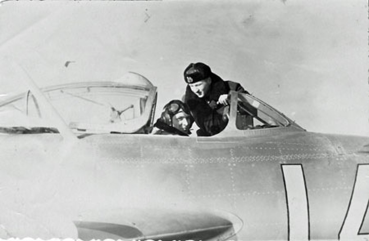Soviet pilot P. I. Isaev in the cockpit of his fighter, Noi Bai airfield, Vietnam.